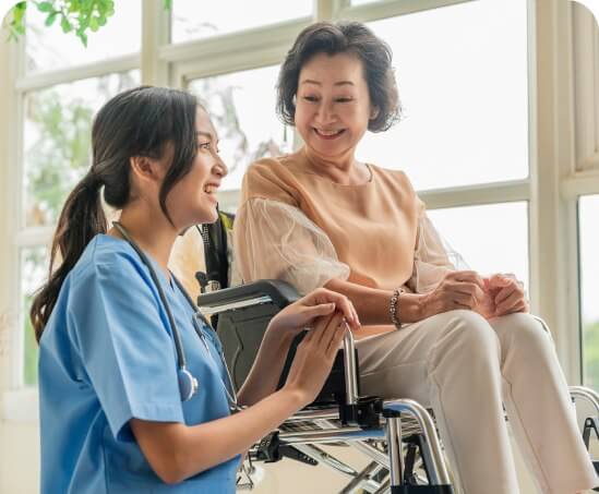 TRC clinician supporting a client using a wheelchair